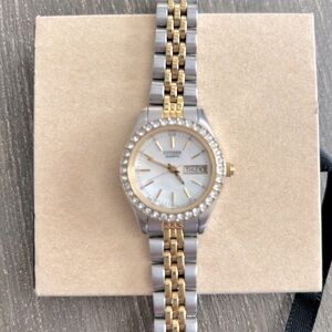 Citizen Ladies’ Gold/Stainless Watch with Swarovski Crystal Halo Face